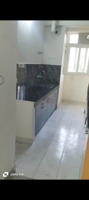 Kitchen in 3 BHK Apartment at Proview Officer City, Raj Nagar Extension – for Rent