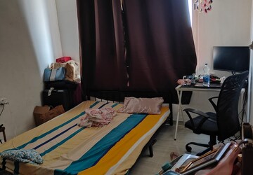 Living Room in 2 BHK Apartment at The Chatterjee The Crown Greens, Hinjewadi – for Rent