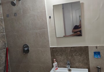 Bathroom in 2 BHK Apartment at The Chatterjee The Crown Greens, Hinjewadi – for Rent