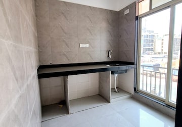 Kitchen in 3 BHK Builder Floor at Dhakoli – for Sale