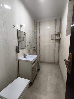 Bathroom in 4 BHK Builder Floor at Sainik Colony – for Rent
