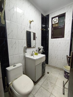 Bathroom in 4 BHK Builder Floor at Sainik Colony – for Rent