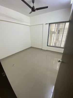 Bedroom in 3 BHK Apartment at Belvalkar Kalpak CHS, Dahanukar Colony – for Rent