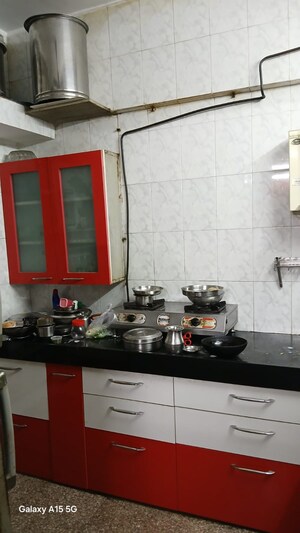 Kitchen in 2 BHK Apartment at Poonam Vaishno Heights, Malad East – for Rent