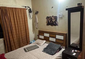Bedroom in 3 BHK Apartment at Green Acres Apartment, Waghbil – for Rent