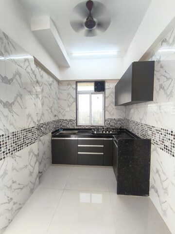 Kitchen in 1 BHK Apartment at DGS Sheetal Tapovan, Malad East – for Rent