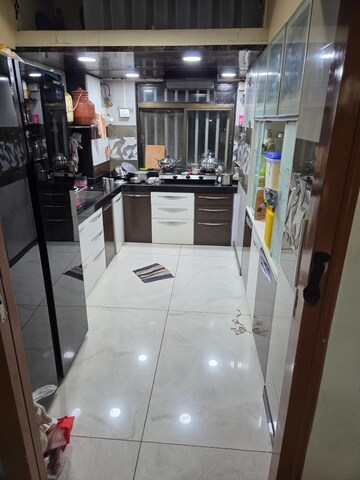Kitchen in 4 BHK Apartment at Mira Nagar – for Sale