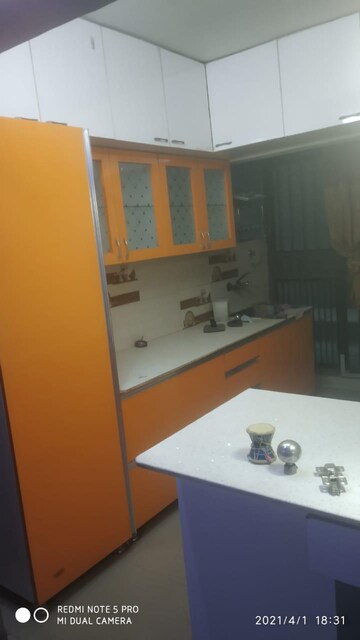 Kitchen in 2 BHK Apartment at Logix Blossom County, Sector 137 – for Sale