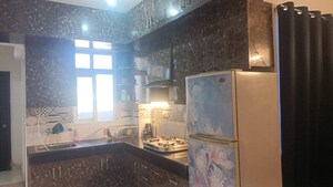 Kitchen in 2 BHK Apartment at Signature The Serenas, Sohna Sector 36 – for Rent