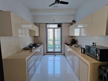 Kitchen in 3 BHK Apartment at Neelkanth Greens, Manpada – for Rent