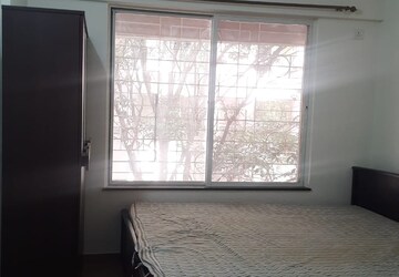 Bedroom in 2 BHK Apartment at GK Peace Valley, Pimple Saudagar – for Rent