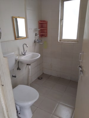 Bathroom in 2 BHK Apartment at Conscient Habitat 78, Sector 78 – for Rent