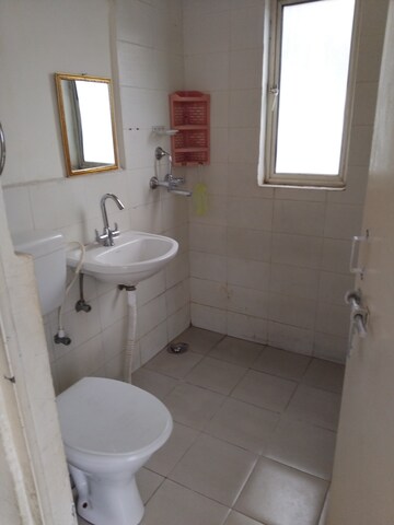 Bathroom in 2 BHK Apartment at Conscient Habitat 78, Sector 78 – for Rent