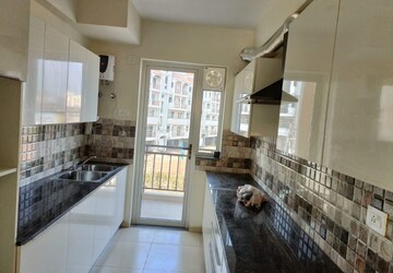 Kitchen in 3 BHK Apartment at Sushma Valencia, International Airport Road – for Rent