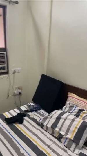 Living Room in 2 BHK Apartment at HDIL Dheeraj Kiran, Malad West – for Rent