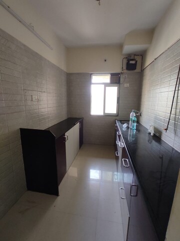 Kitchen in 2 BHK Apartment at Vihang Valley Rio, Kasarvadavali – for Rent