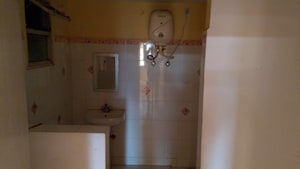 Bathroom in 3 BHK Apartment at Faizabad Road – for Rent