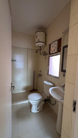 Bathroom in 3 BHK Builder Floor at Ansal Sushant Lok I, Sector 43 – for Rent