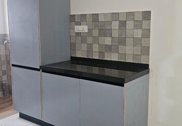 Kitchen in 4 BHK Apartment at D And T Mountain View CHS, Senapati Bapat Road – for Rent