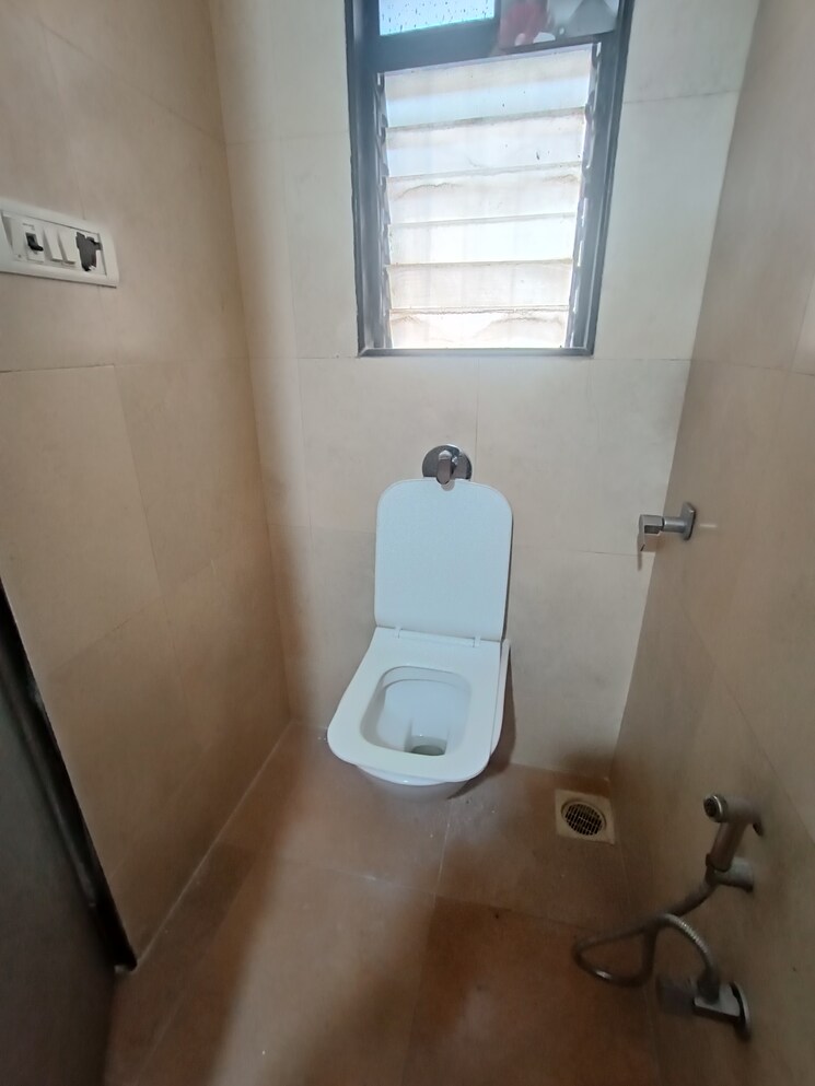 Bathroom, navkar-happy-homes 2 Bedroom 629 Sq.Ft. Apartment In Ic Colony Mumbai 9361993