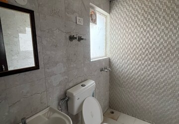 Bathroom in 2 BHK Apartment at Pivotal Riddhi Siddhi, Sector 99 – for Rent