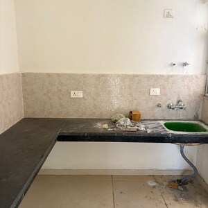 Kitchen in 2 BHK Apartment at Signature The Millennia 3, Sector 37d – for Rent