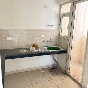 Kitchen in 2 BHK Apartment at Signature The Millennia 3, Sector 37d – for Rent