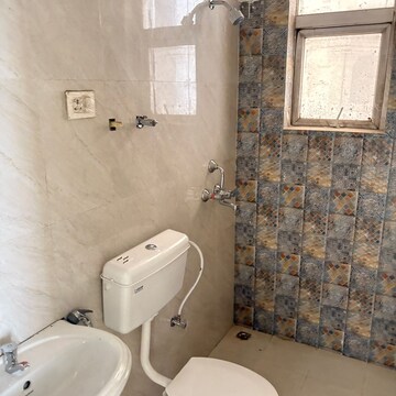 Bathroom in 2 BHK Apartment at Signature The Millennia 3, Sector 37d – for Rent