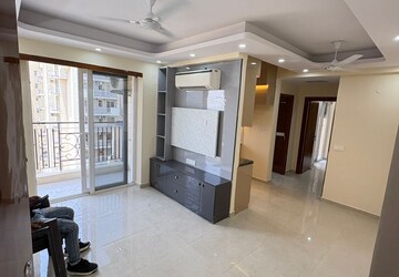 Living Room in 2 BHK Apartment at Signature The Millennia 3, Sector 37d – for Rent