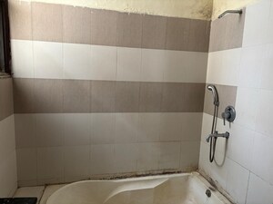 Bathroom in 3 BHK Apartment at NK Savitry Enclave, Vip Road – for Rent