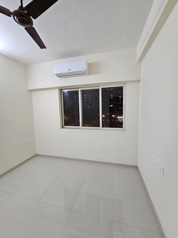 Room in 2 BHK Apartment at Omkar Signet, Malad East – for Rent