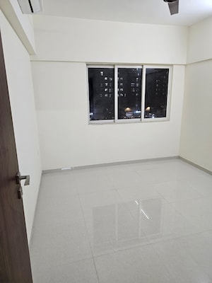 Room in 2 BHK Apartment at Omkar Signet, Malad East – for Rent