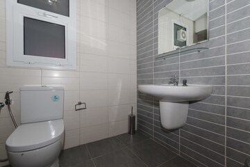 Bathroom in 2 BHK Apartment at Sigma Emerald, Santacruz East – for Rent
