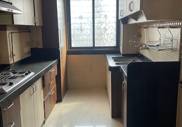 Kitchen in 1 BHK Apartment at Mayuresh Srishti, Sonapur – for Rent