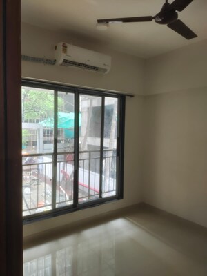 Room in 1 BHK Apartment at Ruparel Elara, Kandivali West – for Rent