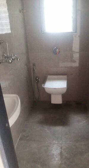 Bathroom in 1 BHK Apartment at Ruparel Elara, Kandivali West – for Rent