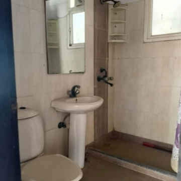 Bathroom in 2.5 BHK Apartment at Mahagun Maestro, Sector 75 – for Sale