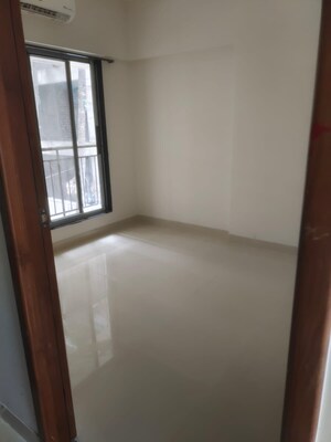 Room in 2 BHK Apartment at Ruparel Elara, Kandivali West – for Rent