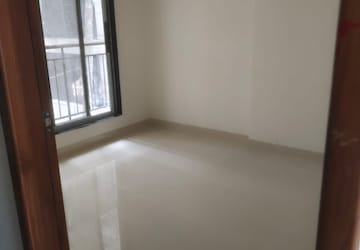 Room in 2 BHK Apartment at Ruparel Elara, Kandivali West – for Rent