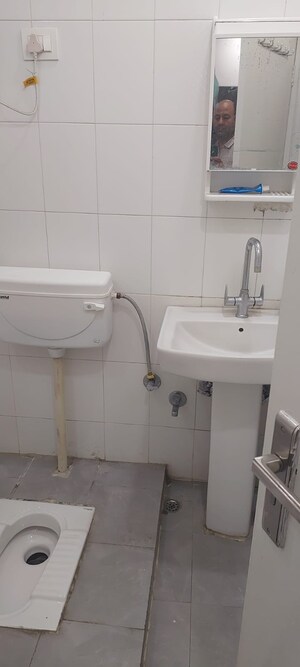 Bathroom in 3 BHK Apartment at HIG Apartments, Omicron I Greater Noida – for Sale