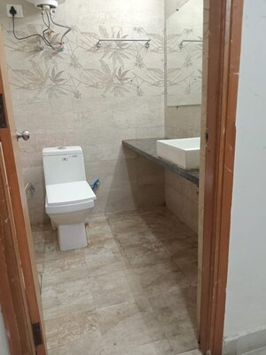 Bathroom in 2 BHK Apartment at Nimbus The Park Street, Chi V Greater Noida – for Sale