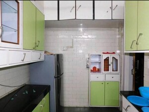 Kitchen in 2 BHK Apartment at Ganga Vihar CHS, Malad East – for Rent