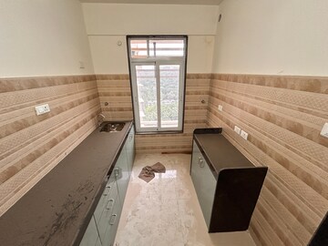 Kitchen in 1.5 BHK Apartment at Sheth Avante, Kanjurmarg West – for Rent