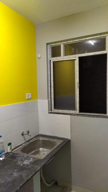 Kitchen in 1 BHK Apartment at Shapoorji Pallonji Shukho Brishti, Rajarhat New Town – for Rent