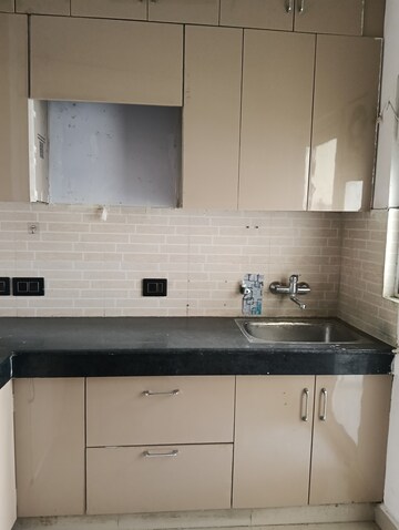 Kitchen in 2 BHK Apartment at VVIP Addresses, Raj Nagar Extension – for Rent