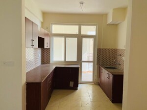 Kitchen in 3 BHK Apartment at Aravali Enclave, Vrindavan Yojna – for Sale