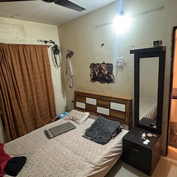 Bedroom in 1 BHK Apartment at Puranik Rumah Bali, Gaimukh Gaon – for Rent