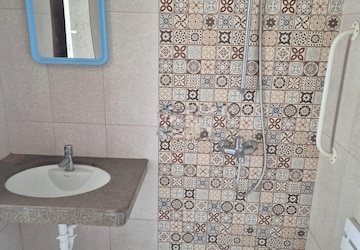 Bathroom in 1 BHK Apartment at Paranjape Forest Trails The Cove, Bhugaon – for Rent