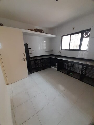 Kitchen in 2 BHK Apartment at Vriddhi Padma Madhav, Dahanukar Colony – for Rent