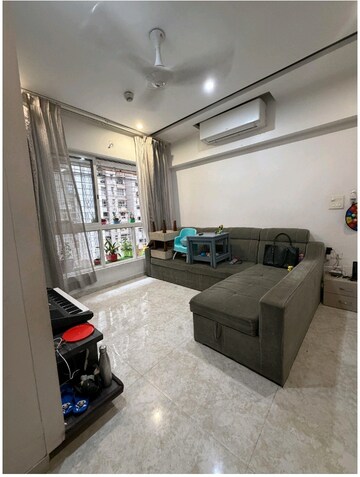 Living Room in 2 BHK Apartment at Lodha Amara, Kolshet Road – for Rent